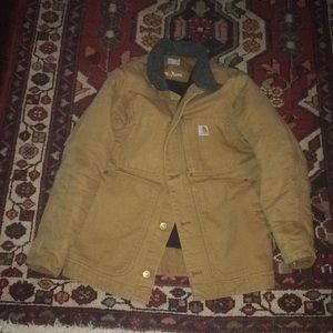 Carhartt jacket. In tan color. Men’s size small.